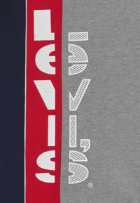 Levi's® STRIPED HOOKUP HOODIE - Jersey con capucha - grey heather