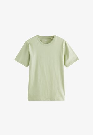 Šviesiai žalia trumpomis rankovėmis medvilninė marškinėlių su apvaliu kaklu ir laisvu siluetu. Paprastas dizainas, lygus paviršius ir minimalus detalių kiekis.