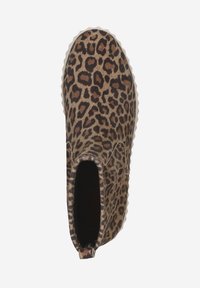 Bottines Chelsea avec un cuir suédé imprimé léopard brun et noir, et une semelle en caoutchouc léger à relief, vues de dessus.