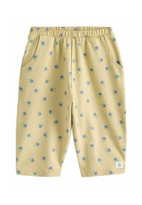 Heledad kollased püksid pehmest kangast, millel on õrn sinine lillemuster, elastne vöökoht ja küljetaskud.