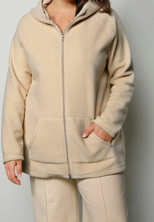 Vetoketjullinen college - beige