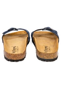 Sandales bleu marine avec une tige en daim doux, une semelle en liège et une semelle extérieure en caoutchouc. Comprend une seule sangle réglable et un design plat.