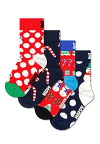 Quatre paires de chaussettes festives : rouges à pois blancs, bleues marine avec des cannes en sucre, et des motifs de bonhommes de neige et de cadeaux dans des couleurs vives.