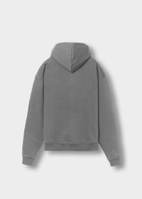 Grauer Hoodie mit lässiger Passform, ausgestattet mit einer Kapuze, langen Ärmeln und einem gerippten Saum. Der Stoff hat eine weiche Textur und eine einheitliche Farbe.