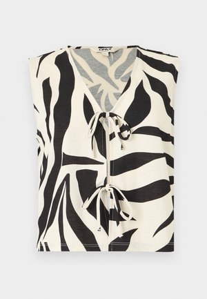 Top sin mangas con estampado de cebra en blanco y negro, con escote en V y dos cierres de lazo delanteros.