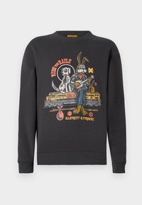 Black sweatshirt featuring a graphic print of a rabbit playing guitar beside a dog. Text reads "Ride the Rails" and "Element & Timber."