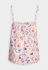 Top rose clair bretelles spaghetti avec un petit imprimé floral multicolore en bleu, orange, violet et vert sur fond uni.