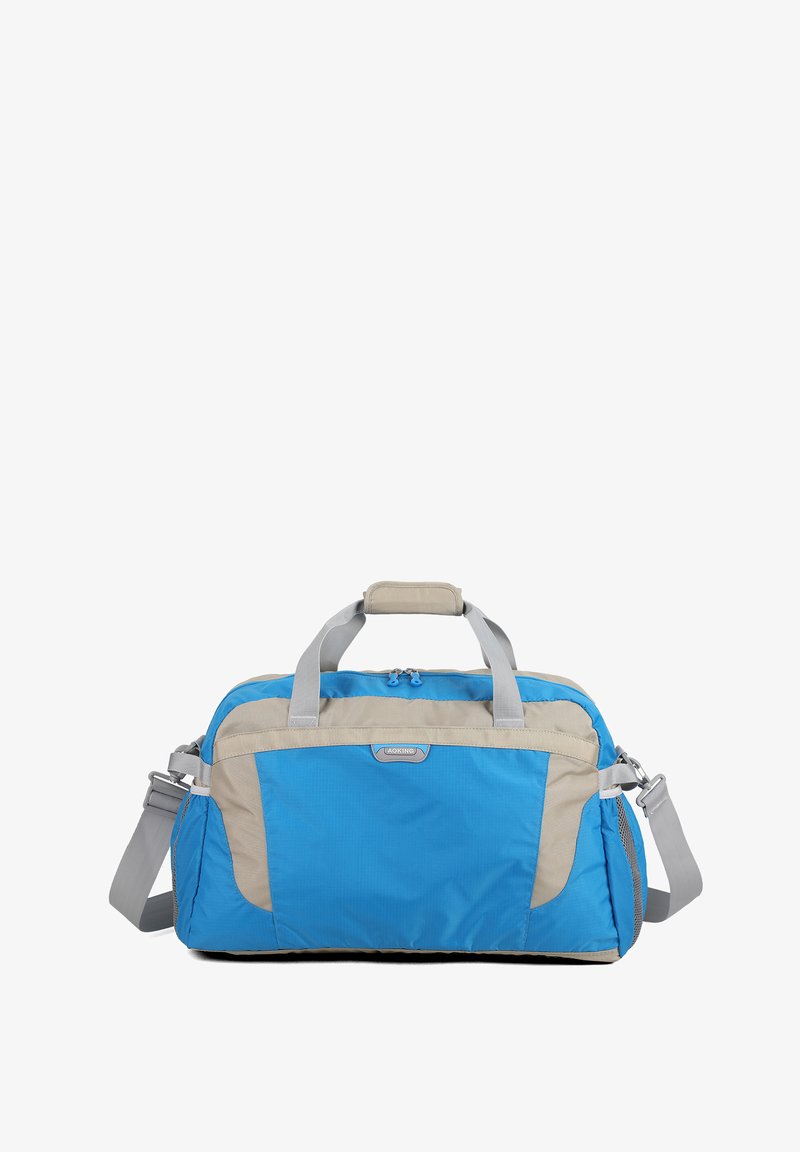 Sac de sport bleu et beige avec double poignée, bandoulière réglable, poche zippée à l'avant et poignée rembourrée sur les poignées supérieures.