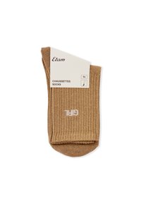 Calcetines marrones de canalé doblados con el texto blanco "GIRL", etiquetados como "Etam Chaussettes Socks" en una etiqueta blanca, aislados sobre un fondo blanco.
