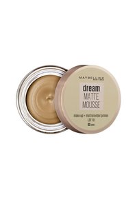 Primer Maybelline Dream Matte Mousse in un barattolo di vetro rotondo con bordo argentato, caratterizzato da un colore beige chiaro e una consistenza liscia.