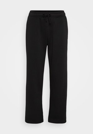 Černé tepláky rovného střihu s elastickým páskem a nastavitelnou šňůrkou, vystavené na bílém pozadí.