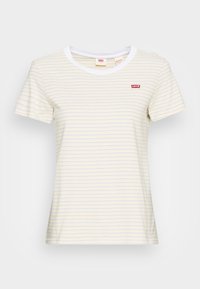 T-shirt z krótkim rękawem w jasnym odcieniu �żółtego z cienkimi niebieskimi i białymi paskami. Posiada biały okrągły dekolt i czerwone logo Levi's na piersi.