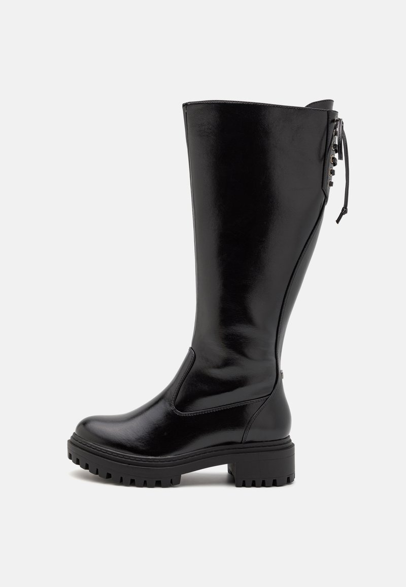 Black knee-high boot with a glossy finish, elastic side panel, thick rubber sole, and decorative hardware at the ankle.