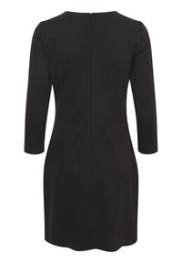 Robe noire à manches longues, col rond, avec une fermeture éclair dissimulée dans le dos. Tissu lisse, silhouette ajustée et coutures minimales.