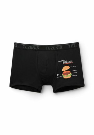 Černé bavlněné trenýrky s grafickým potiskem burgeru a textem "ANATOMIE BURGERU", který zobrazuje ingredience a vrstvy.