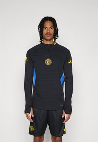 adidas Performance MANCHESTER UNITED 25/26 EUROPEAN PRO TRAINING TOP - Φανέλα τερματοφύλακα - black/blue/tribe yellow