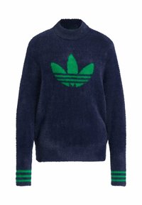 Marineblå fuzzy genser med grønt trefoil-logo, grønne striper på ermene og høy hals. Myk tekstur og avslappet passform.