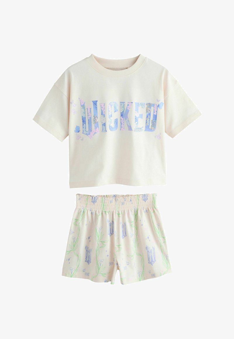 Haut court à manches courtes crème avec le mot « LUCKED » en lettres florales bleues, accompagné d'un short assorti avec un motif de vigne verte et de fleurs bleues.
