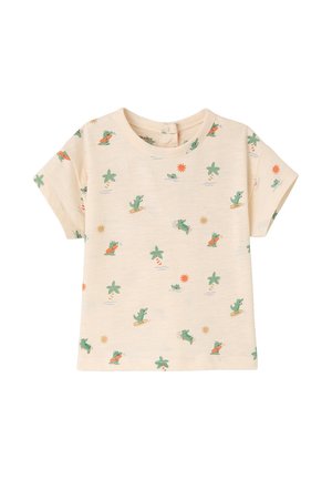Beige short-sleeve toddler shirt with all-over print of green crocodiles surfing, palm trees, and orange suns.
