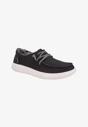 Scarpa casual nera slip-on con suola bianca screziata e fodera interna con motivo, caratterizzata da lacci a corda bianchi e neri e design a profilo basso.