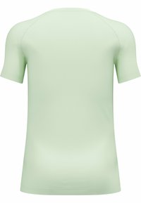 Light green short-sleeve athletic shirt with a textured, breathable fabric. Features a round neckline and seamless raglan sleeves.