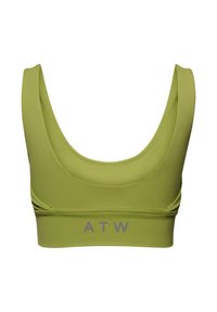 Oliven grøn sports-bh med rund halsudskæring, blødt stof og flade sømme. Har et gråt "ATW" logo på den forreste del. Ingen lukninger.