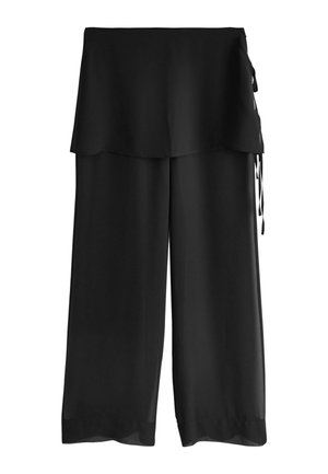 Pantaloni neri a gamba larga con dettaglio a gonna a strati e chiusure laterali con laccio in vita.