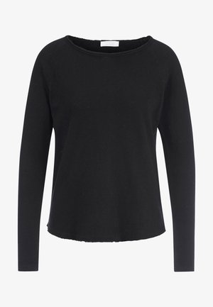 Camisa negra de manga larga con cuello redondo, con un dobladillo ligeramente deshilachado, hecha de una tela texturizada con un ajuste holgado. Sin logotipo visible.