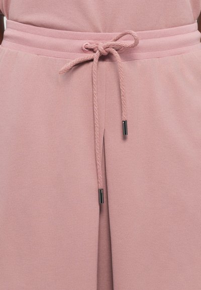 Ροζ υφασμάτινα παντελόνια jogger με κορδόνι μέσης που διαθέτουν υφή και μεταλλικούς ρυθμιστές ασημένιου τόνου στο κορδόνι.
