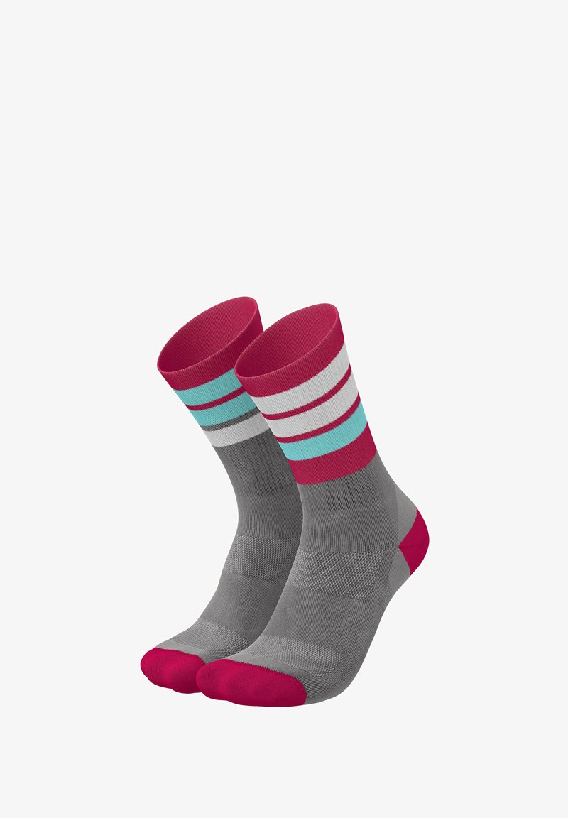 Gray crew socks with pink toe and cuff, featuring five horizontal stripes in red, white, and turquoise. Textured and fitted design.