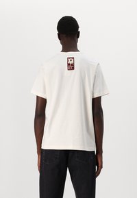 Marimekko VIHNE UNIKKO UNISEX - T-shirt med print - off white