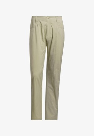 Beežid sirge lõikega püksid ees nupu ja luku ning küljetaskutega, esitletud valgel taustal.