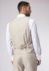 ROY ROBSON Veste sans manches - beige
