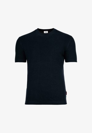 Suéter negro de punto de manga corta con cuello redondo y puños acanalados, que incluye una pequeña etiqueta blanca de la marca en el interior del cuello.