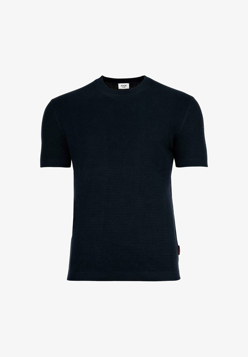 Pull en tricot noir à manches courtes avec col rond et poignets côtelés, arborant une petite étiquette de marque blanche à l'intérieur du col.