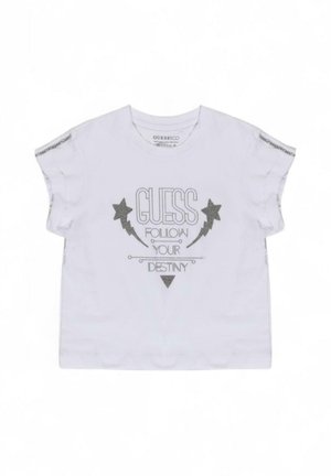 T-shirt bianco a maniche corte con stampa argentata "GUESS FOLLOW YOUR DESTINY" e grafiche di stelle e fulmini. Accenti testurizzati sulle spalle.