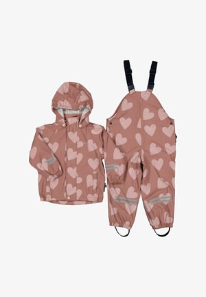 Waterproof children's raincoat and overalls set in pastel pink with large light pink heart patterns, featuring gray reflective stripes and adjustable straps.