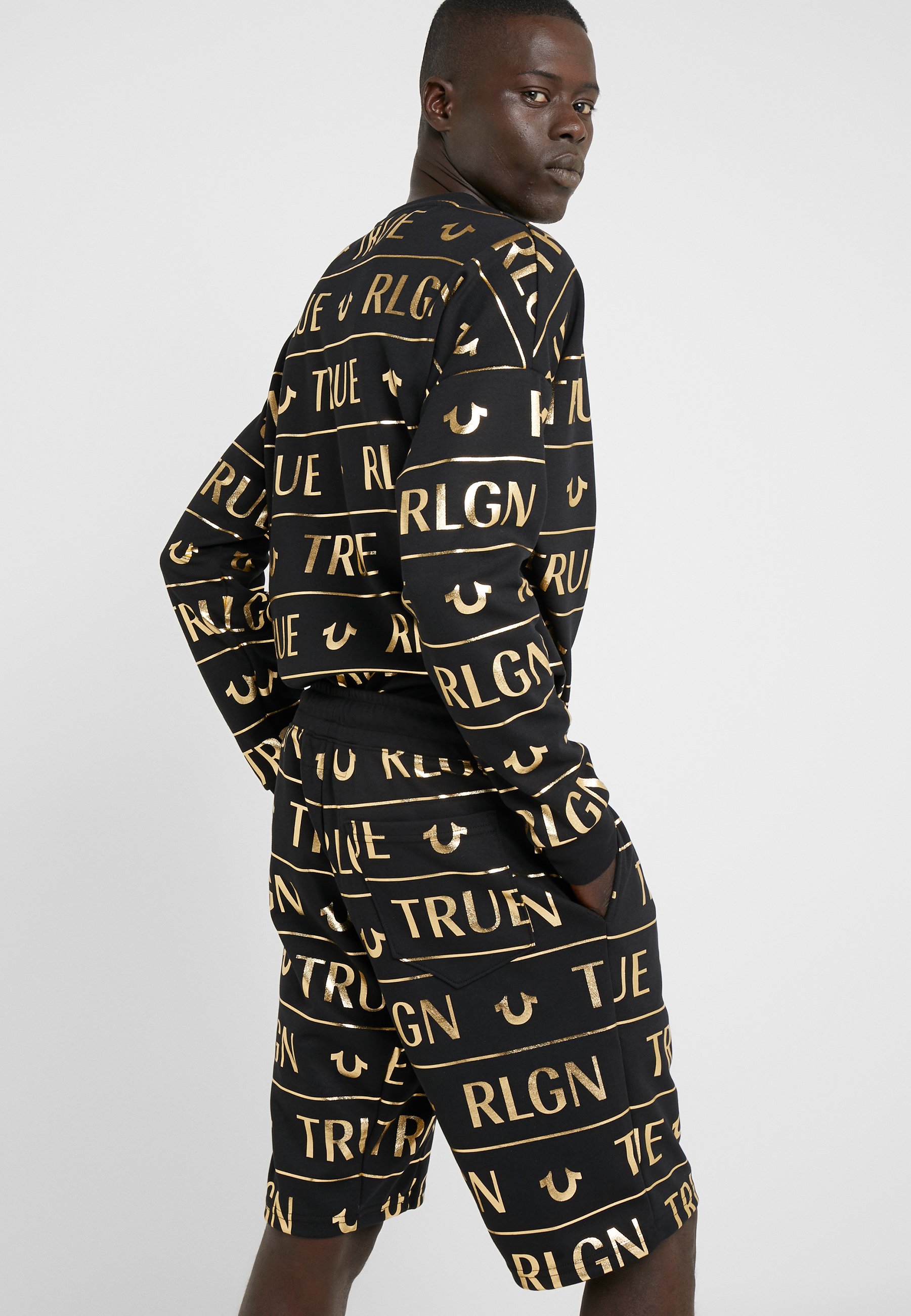black and gold true religion tracksuit