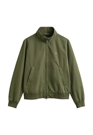 Olivgrüne Zip-up-Jacke mit Stehkragen, zwei Fronttaschen, elastischen Bündchen und kleinem, links auf der Brust gesticktem Logo.