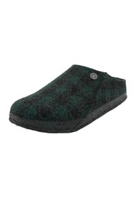 Wool clog slipper in dark green and black plaid pattern, featuring a low back and textured black rubber sole for grip.