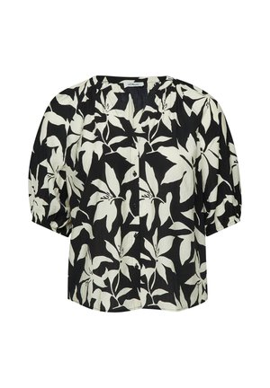 Blouse noire avec imprimé floral blanc, boutonnage devant, manches courtes bouffantes et encolure ronde.