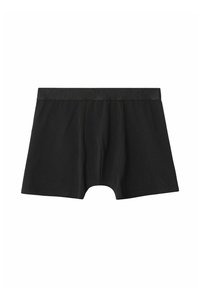 Svarta bomullskalsonger med ett strukturerat midjeband. Har en framöppning och en tight passform, vilket betonar en minimalistisk design.