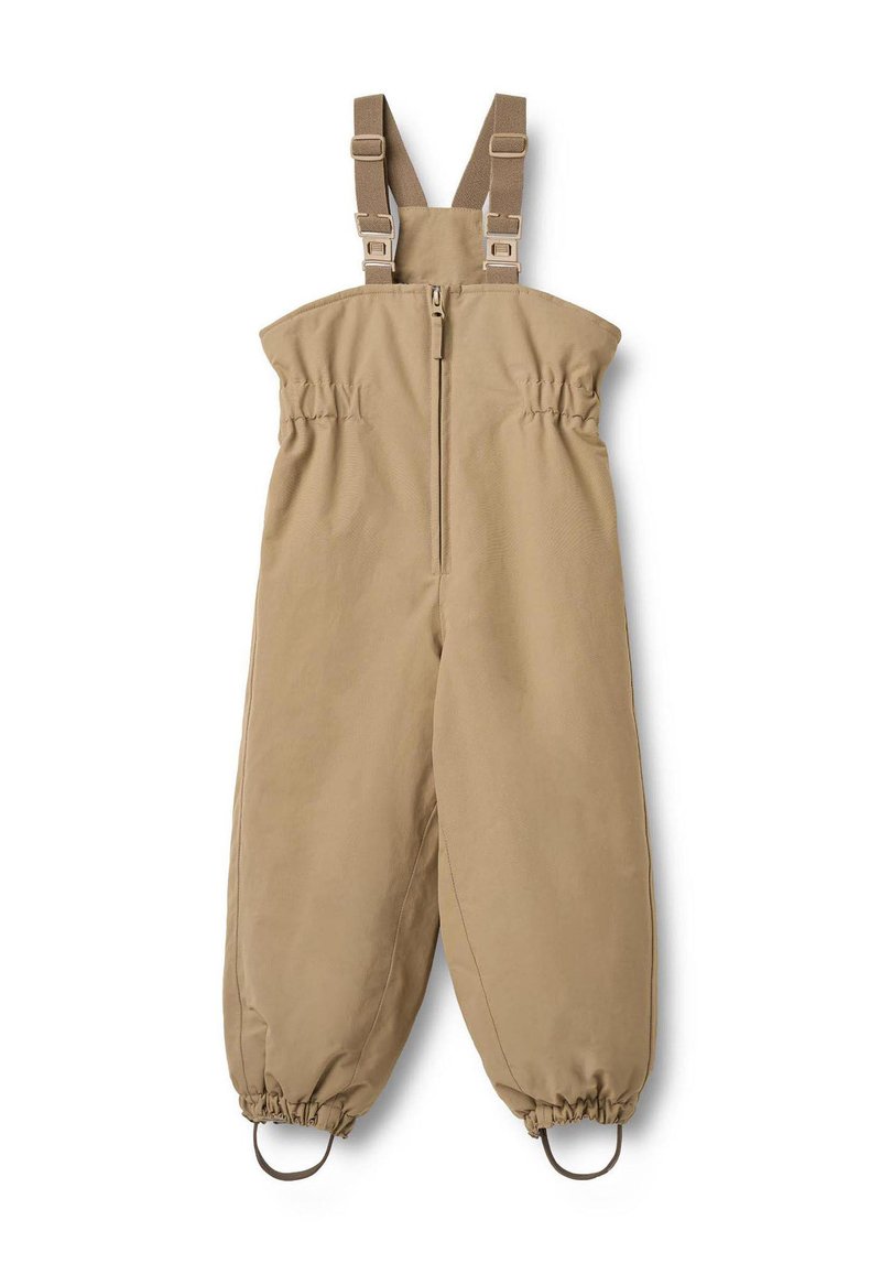 Tuta kaki con bretelle marroni regolabili, zip frontale, elastico in vita e ai polsini, con accessori metallici e passanti alle caviglie.