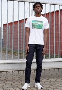 Levi's® Skateboarding SKATE 511 SLIM 5 POCKET - Kavbojke slim fit - caviar bull denim