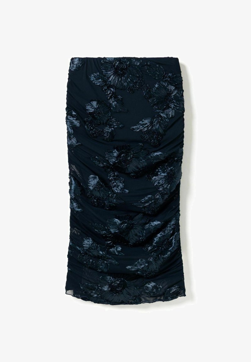Sort pencilskørt med rynker, blankt blomstermønster i fløjl og let gennemsigtig kantdetalje.