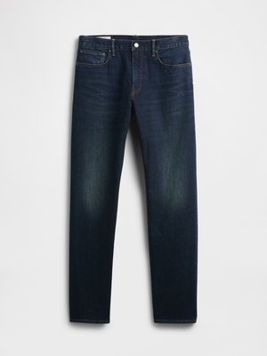Dark blue denim jeans with a straight cut, featuring five pockets, a button fly, and subtle fading on the thighs. Classic stitching detail.