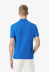 Lacoste Piké - gipsy blue