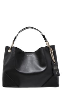 Black leather handbag with a smooth texture, curved silhouette, and contrasting chain handle. Features triangular accents and a brand tag.