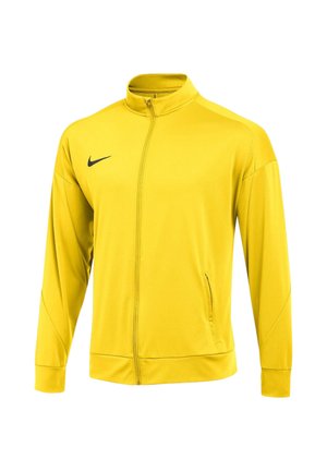 Gelbe Sportjacke mit langen Ärmeln, Frontreißverschluss, Stehkragen, seitlicher Reißverschlusstasche und kleinem schwarzem Nike-Logo auf der Brust.
