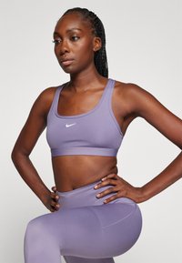 Nike Performance BRA - Sportski grudnjak s blagom potporom - daybreak/white